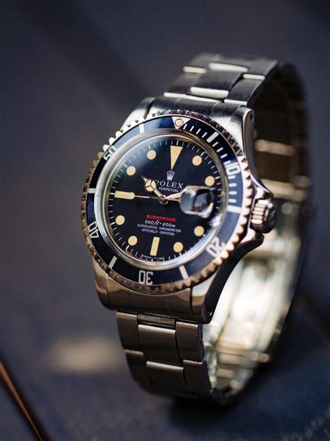 rolex 1680 red submariner reference.